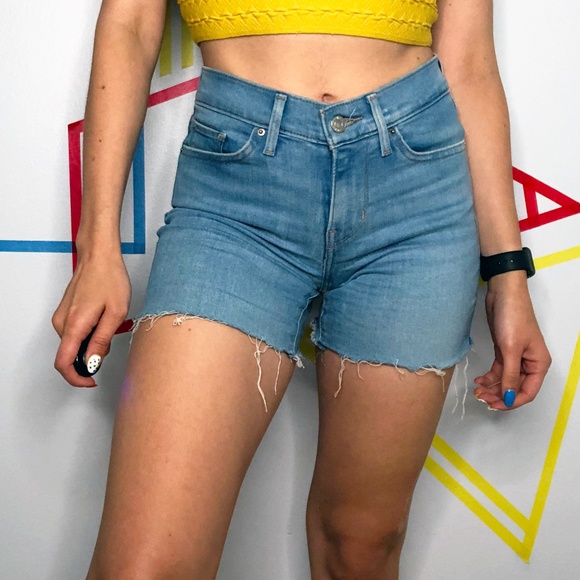 Levi’s Medium Wash Cut Off Shorts - Picture 2 of 4